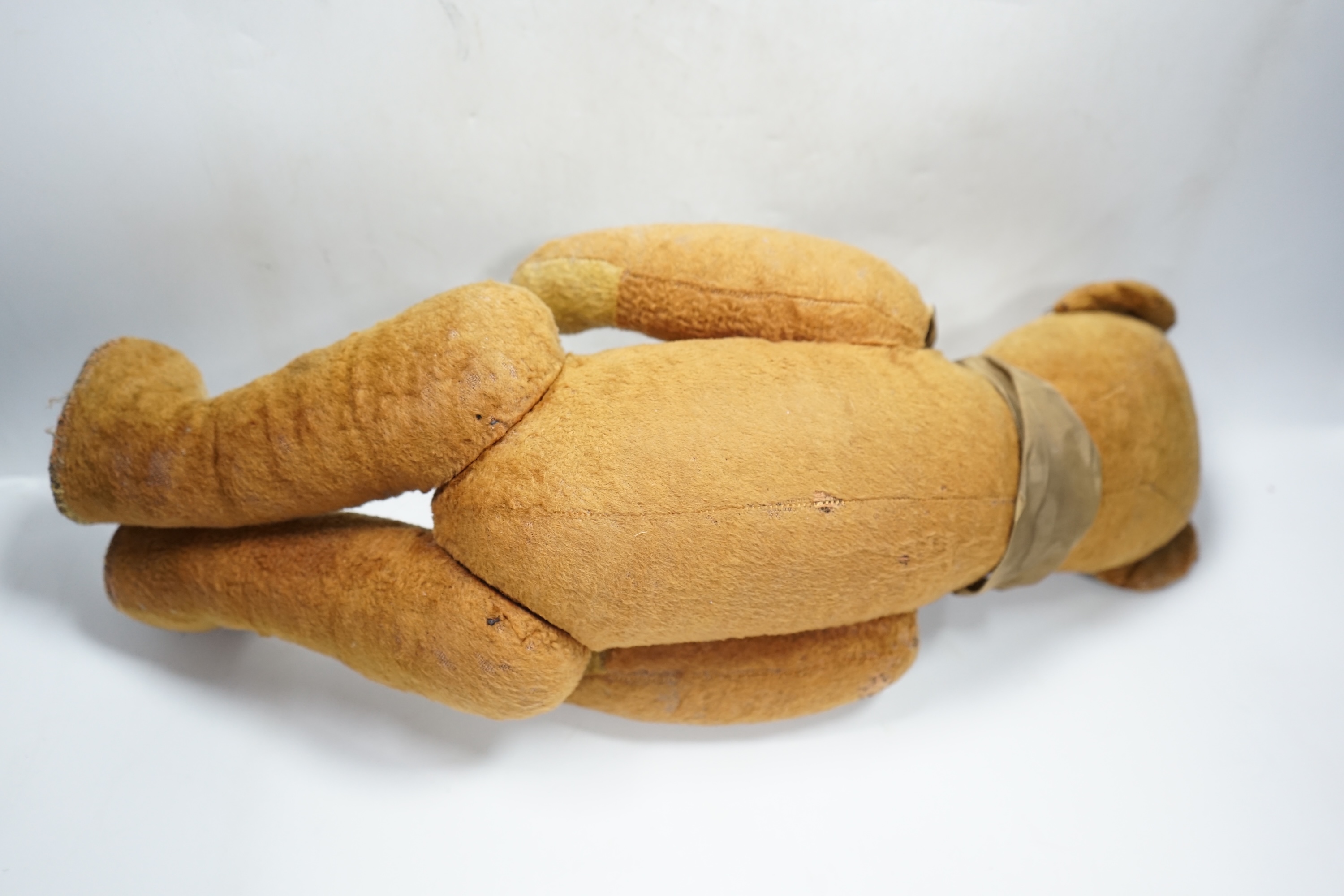 A 1930’s jointed Teddy bear, 53cm. Condition - poor